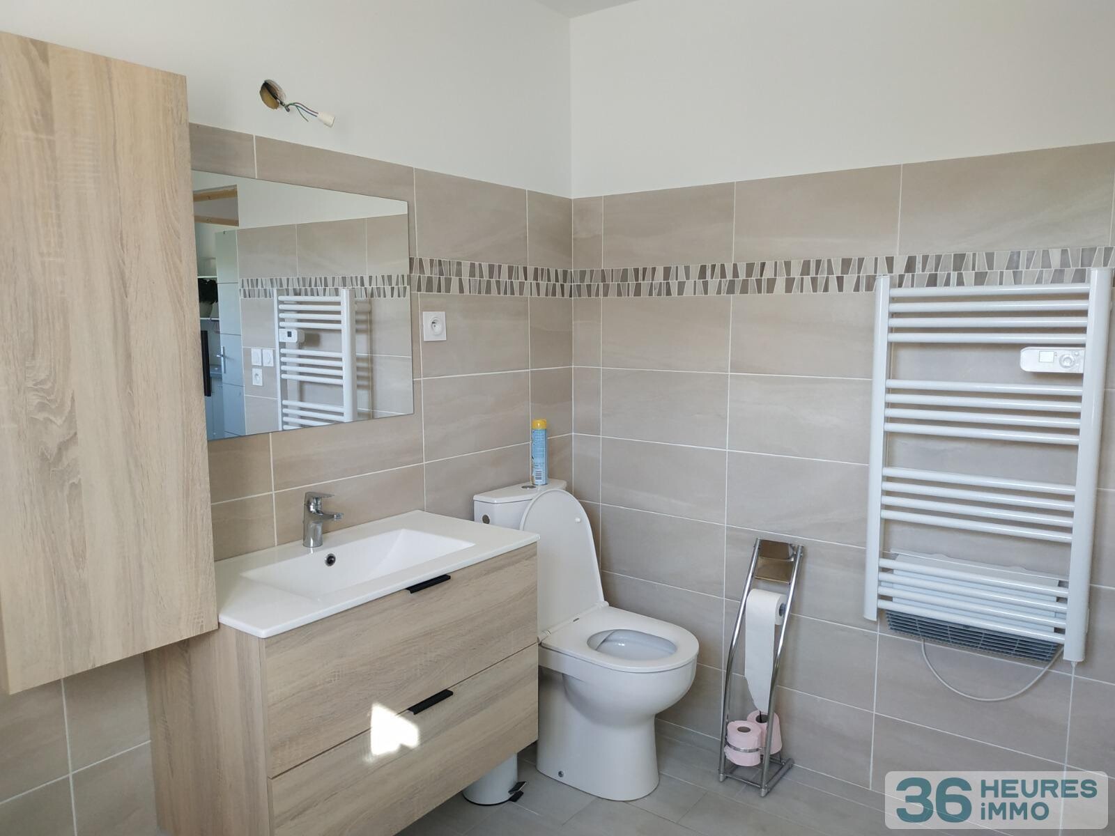 Maison en ossature bois sur sous-sol avec terrasse et vue sur la forêt